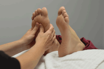 PhysioWell Health Solutions Reflexology Treatment on Foot image